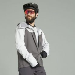 Kurtka przeciwdeszczowa rowerowa Rockrider MTB All Mountain. Brązowe kurtki ROCKRIDER, l, bez wzorów, z materiału, bez kaptura. Za 409.99 zł.