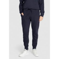 Spodnie Mężczyzna NAPAPIJRI MALIS. Niebieskie spodnie treningowe długie Napapijri, m, bez wzorów. Za 333.05 zł.