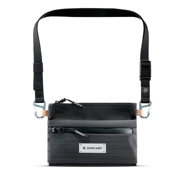 Saszetka na szyję Heimplanet Carry Essentials. Szare torby na ramię HEIMPLANET, bez wzorów, z materiału, bez dodatków. Za 184.50 zł.