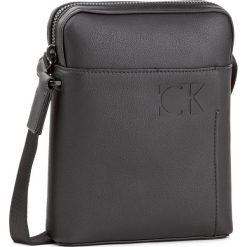 Saszetka CALVIN KLEIN BLACK LABEL - Hi-Profile Mini Repo K50K503592 001. Saszetki i nerki marki Calvin Klein Black Label. W wyprzedaży za 269.00 zł.