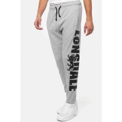 Spodnie dresowe klasyczne Lonsdale Portessie. Czarne spodnie materiałowe Lonsdale, m, bez wzorów, z dresówki, klasyczne. Za 255.00 zł.