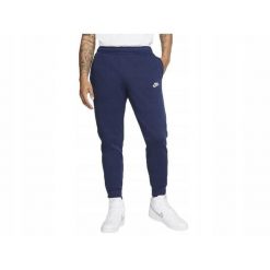 Spodnie dresowe męskie NIKE bawełna ocieplane. Niebieskie szorty Nike, m, bez wzorów, z bawełny. Za 249.99 zł.