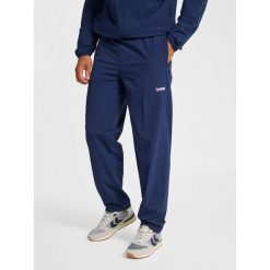 Spodnie dresowe Hummel Pulse. Niebieskie szorty Hummel, bez wzorów, z dresówki, sportowe. Za 312.00 zł.