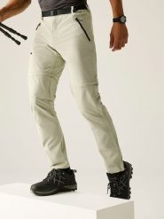 Regatta Spodnie trekkingowe Zipp-Off "Xert Stretch" w kolorze kremowym rozmiar: 52. Brązowe spodnie treningowe długie Regatta, bez wzorów, z materiału. Za 190.18 zł.