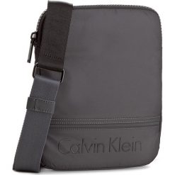 Saszetka CALVIN KLEIN - Matthew Flat Crossov K50K502881 009. Saszetki i nerki CALVIN KLEIN. W wyprzedaży za 179.00 zł.