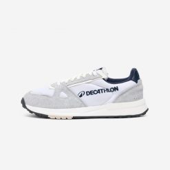Buty sportowe RR70 Edycja Vintage. Białe buty sportowe casual Decathlon, bez wzorów, z kauczuku, bez zapięcia. Za 229.99 zł.