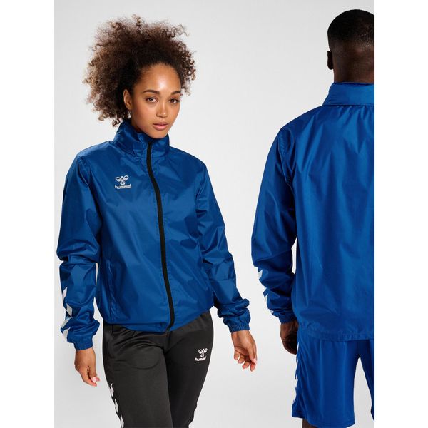 Kurtka ortalionowa piłkarska dla dorosłych Hummel Core XK Spray Jacket. Niebieskie kurtki Hummel, l, bez wzorów, bez kaptura. Za 168.00 zł.