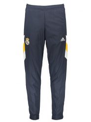 Adidas Spodnie sportowe "Real Madrid" w kolorze granatowo-żółtym rozmiar: M. Niebieskie spodnie treningowe długie Adidas, m, bez wzorów. Za 109.26 zł.