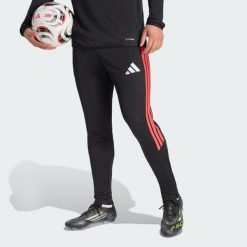 Spodnie treningowe Tiro26 League Regular. Czarne spodnie treningowe długie Adidas, bez wzorów, z dresówki. Za 219.00 zł.