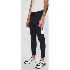 Armani Exchange - Spodnie. Spodnie materiałowe marki Armani Exchange. Za 469.90 zł.