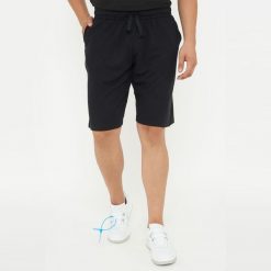 Spodenki sportowe F 9 dla mężczyzn czarne. Czarne krótkie spodenki sportowe Legea, m, bez wzorów, z bawełny. Za 72.00 zł.
