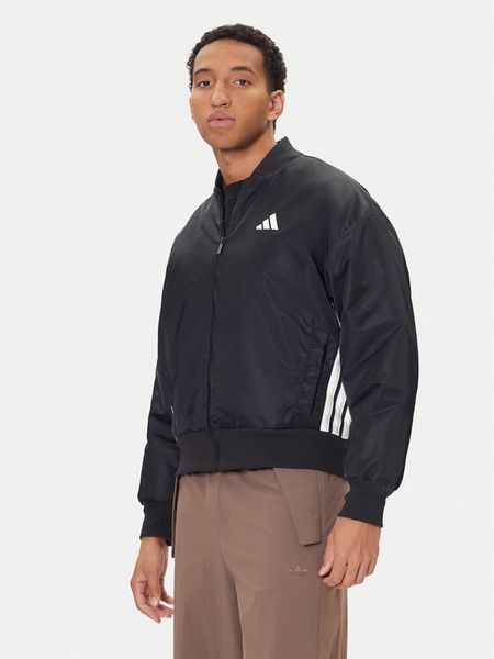 Adidas Kurtka bomber Stadium JN1825 Czarny Loose Fit. Czarne kurtki Adidas, m, bez wzorów, z syntetyku, bez kaptura. Za 349.99 zł.