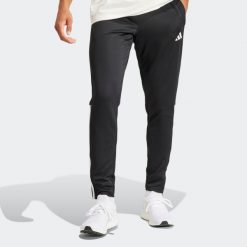 Spodnie treningowe do piłki nożnej ADIDAS Sereno. Czarne spodnie treningowe długie Adidas, l, bez wzorów, z dresówki. W wyprzedaży za 129.99 zł.