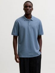 Jack & Jones Koszulka polo "Austin" w kolorze niebieskim rozmiar: S. Niebieskie koszulki polo Jack & Jones, s, bez wzorów, bez kołnierzyka, bez ramiączek. Za 69.99 zł.
