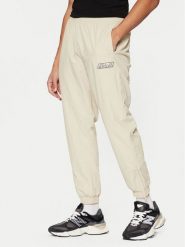 Karl Kani Spodnie dresowe Sport Patch Essential 60030075 Beżowy Relaxed Fit. Brązowe spodnie treningowe długie Karl Kani, l, bez wzorów, z dresówki. Za 159.99 zł.