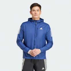 Kurtka Own The Run. Niebieskie kurtki Adidas, bez wzorów, bez kaptura, do biegania. Za 379.00 zł.