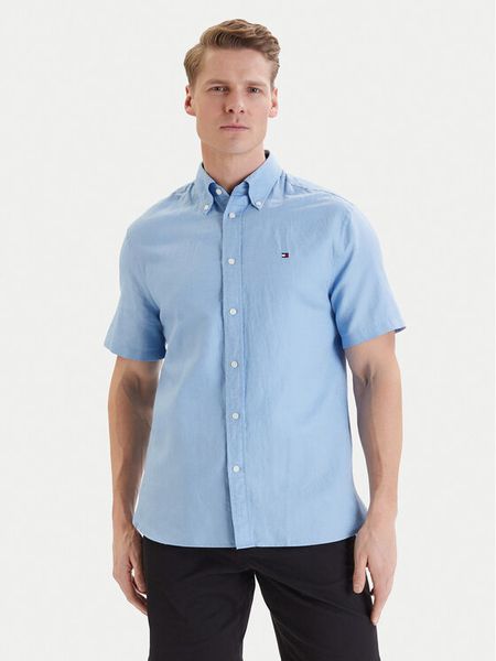 Tommy Hilfiger Koszula MW0MW42450 Niebieski Regular Fit. Niebieskie koszule Tommy Hilfiger, l, bez wzorów, z bawełny, bez kołnierzyka, bez ramiączek. Za 369.99 zł.