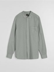 Bawełniana koszula z długim rękawem i kieszenią piersiową - zielony. Zielone koszule Sinsay, l, bez wzorów, z bawełny, bez kołnierzyka, bez ramiączek. Za 59.99 zł.