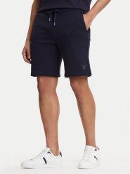 Guess Szorty sportowe M6GD12 K3020 Granatowy Slim Fit. Niebieskie krótkie spodenki sportowe Guess, m, z aplikacjami, z bawełny. Za 249.99 zł.
