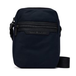 Saszetka Tommy Hilfiger. Niebieskie saszetki i nerki Tommy Hilfiger, bez wzorów, z nylonu, małe, bez dodatków. Za 329.99 zł.