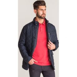 Granatowa pikowana kurtka Joop Clint. Niebieskie kurtki Joop! Collection, na lato, m, z aplikacjami, ze skóry, bez kaptura. Za 699.50 zł.
