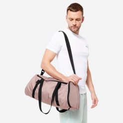 Torba fitness Domyos 20 l. Brązowe torby na ramię DOMYOS, bez wzorów, z materiału, na ramię, średnie, bez dodatków. Za 39.99 zł.