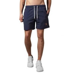 Spodenki kąpielowe męskie Urban Classics Block Swim. Niebieskie krótkie spodenki sportowe Urban Classics, m, bez wzorów, z materiału. Za 87.45 zł.