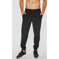 Calvin Klein Performance - Spodnie. Spodnie treningowe długie marki WED'ZE. Za 269.90 zł.