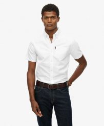 Superdry Koszula Oxford krótkiego rękawa z bawełny organicznej. Białe koszule Superdry, m, bez wzorów, z bawełny, bez kołnierzyka, bez ramiączek. Za 279.65 zł.
