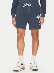 Tommy Jeans Szorty sportowe Varsity DM0DM20936 Granatowy Regular Fit. Niebieskie krótkie spodenki sportowe Tommy Jeans, m, bez wzorów, z bawełny. Za 249.99 zł.