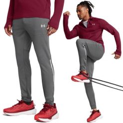 Spodnie treningowe męskie Under Armour wygodne dresowe do ćwiczeń. Szare spodnie treningowe długie Under Armour, m, bez wzorów, z dresówki. W wyprzedaży za 262.95 zł.