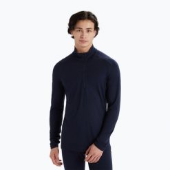 Bluza termoaktywna męska icebreaker Merino 200 Oasis Half Zip. Niebieskie bielizna termoaktywna Icebreaker, na zimę, m, bez wzorów, bez ramiączek, narciarskie. Za 359.99 zł.