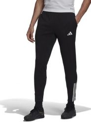 Adidas Spodnie dresowe "Tiro 23" w kolorze czarnym rozmiar: M. Czarne spodnie treningowe długie Adidas, m, bez wzorów, z dresówki. Za 96.83 zł.