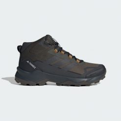 Buty turystyczne Terrex Skychaser AX5 Mid GORE-TEX. Brązowe buty turystyczne Adidas, bez wzorów, z gore-texu, bez zapięcia, trekkingowe, gore-tex. Za 599.00 zł.