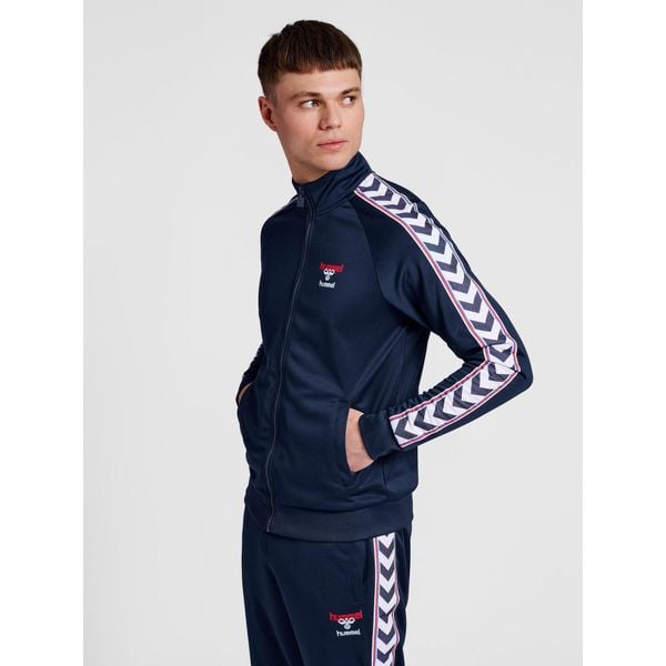 Bluza dresowa zapinana na zamek błyskawiczny Hummel IC Lerby Poly. Niebieskie bluzy bez kaptura Hummel, xs, bez wzorów, z dresówki, bez kaptura. Za 299.00 zł.