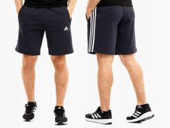 Spodenki męskie adidas Essentials Fleece 3-Stripes Shorts. Niebieskie krótkie spodenki sportowe Adidas, m, bez wzorów, z bawełny. Za 134.99 zł.