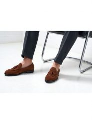 British Passport Skórzane mokasyny "Tassel" w kolorze jasnobrązowym rozmiar: 42. Brązowe botki sznurowane British Passport, bez wzorów, ze skóry, bez obcasa, bez zapięcia. Za 448.99 zł.