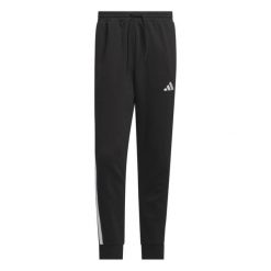 Spodnie dresowe adidas Essentials Three Stripes. Białe spodnie materiałowe Adidas, na co dzień, bez wzorów, z dresówki, sportowe. Za 218.50 zł.