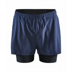 Szorty Craft 2-in-1 adv essence stretch. Niebieskie szorty Craft, xl, bez wzorów, sportowe. W wyprzedaży za 229.50 zł.