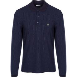 Koszulka polo w kolorze granatowym. Koszulki polo marki LACOSTE. W wyprzedaży za 259.95 zł.