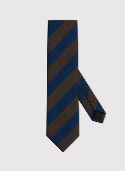 PAKO LORENTE – Granatowy krawat męski w skośne pasy. Niebieskie krawaty i muchy Pako Lorente, bez wzorów, z poliesteru. Za 69.99 zł.