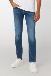 GUESS Niebieskie męskie spodnie jeansowe Finnley. Niebieskie jeansy Guess, m. W wyprzedaży za 269.99 zł.