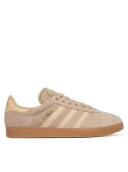 Adidas Sneakersy Gazelle KK2638 Brązowy. Brązowe buty sportowe casual Adidas, bez wzorów, ze skóry, bez zapięcia. Za 479.99 zł.
