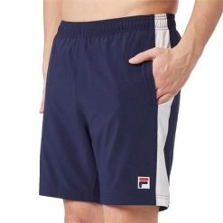 Spodnie treningowe męskie Fila FBM2415011501. Niebieskie spodnie materiałowe Fila, na co dzień, m, bez wzorów, z dresówki, casualowe, krótkie. Za 349.00 zł.