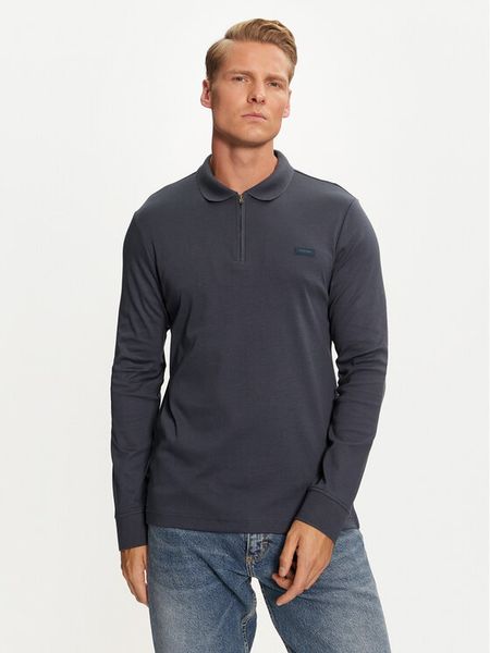 Calvin Klein Polo K10K113586 Niebieski Slim Fit. Niebieskie koszulki polo CALVIN KLEIN, m, bez wzorów, z bawełny, bez kołnierzyka, bez ramiączek. Za 519.99 zł.