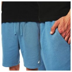 Spodenki dresowe męskie 4F 4FWSS25TSHOM0818. Niebieskie krótkie spodenki sportowe 4F, m, bez wzorów, z bawełny. Za 69.99 zł.