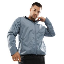 Męska treningowa kurtka wiatrówka Fitness Siroko Evolve. Niebieskie kurtki SIROKO, m, bez wzorów, z materiału, z kapturem. Za 211.00 zł.