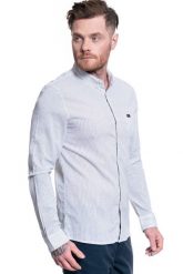 MĘSKA KOSZULA MATERIAŁOWA LEE SLIM BUTTON DOWN WHITE L66XNG12 112116763. Białe koszule Lee, l, bez wzorów, z materiału, bez kołnierzyka, bez ramiączek. Za 129.99 zł.