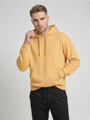 Bluza z kapturem comfort fit z domieszką bawełny - kremowy. Białe bluzy z kapturem Sinsay, l, bez wzorów, z bawełny, z kapturem. Za 39.99 zł.
