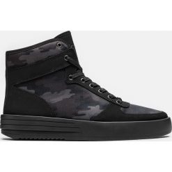 Czarne sneakery męskie. Buty sportowe casual marki Kazar. Za 469.00 zł.